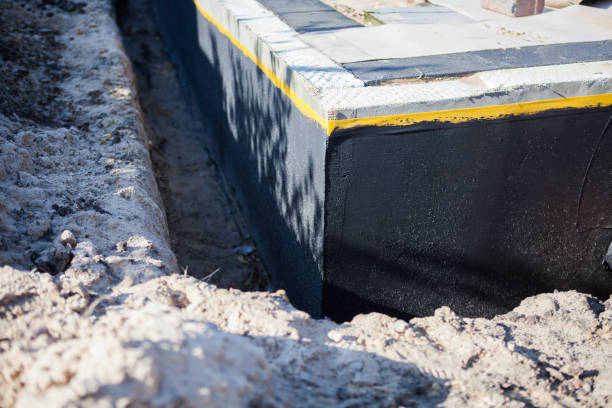 Professional Basement Waterproofing technician working in Fairfield, OH